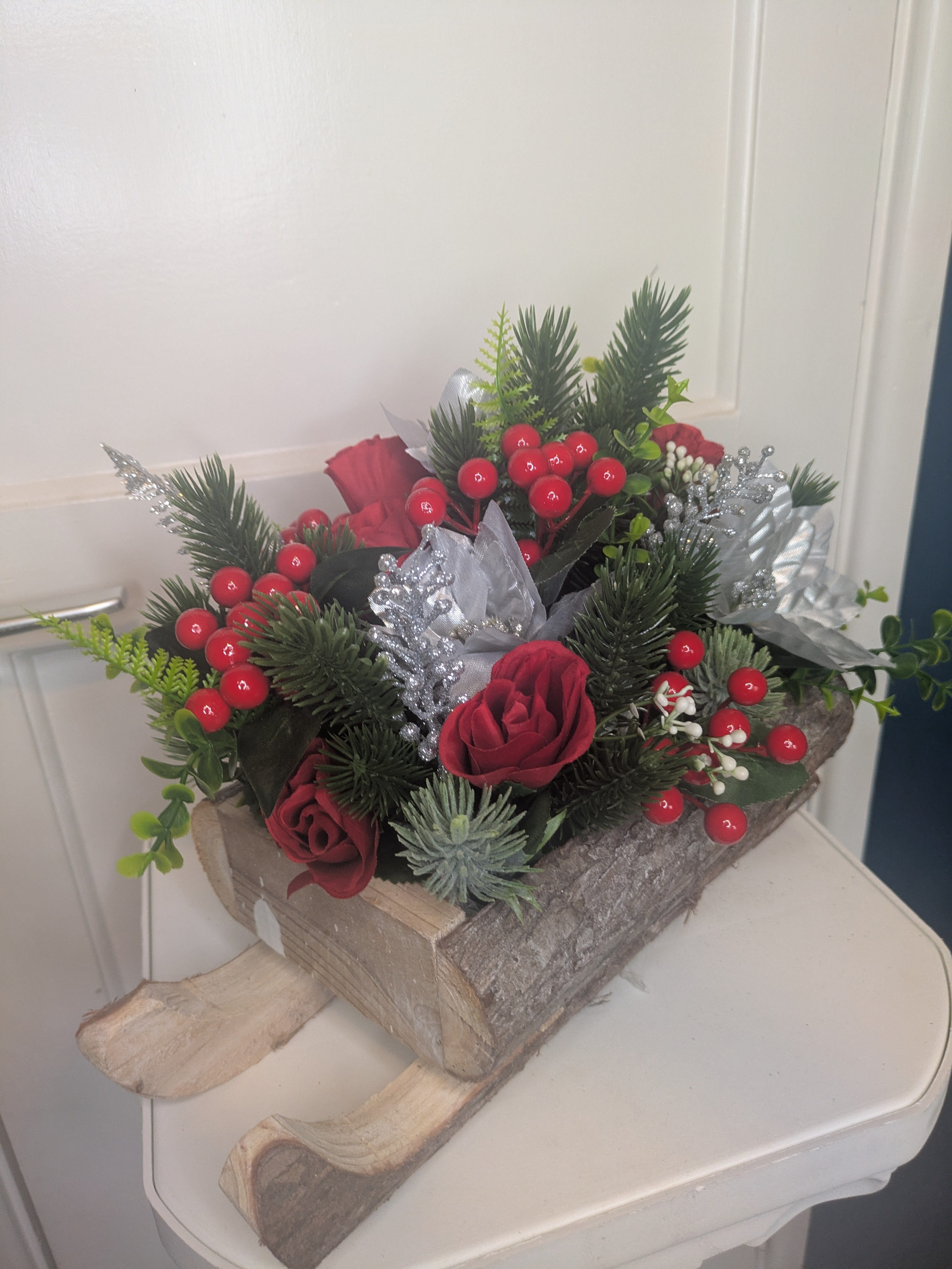 Red, silver and green Sledge Arrangement