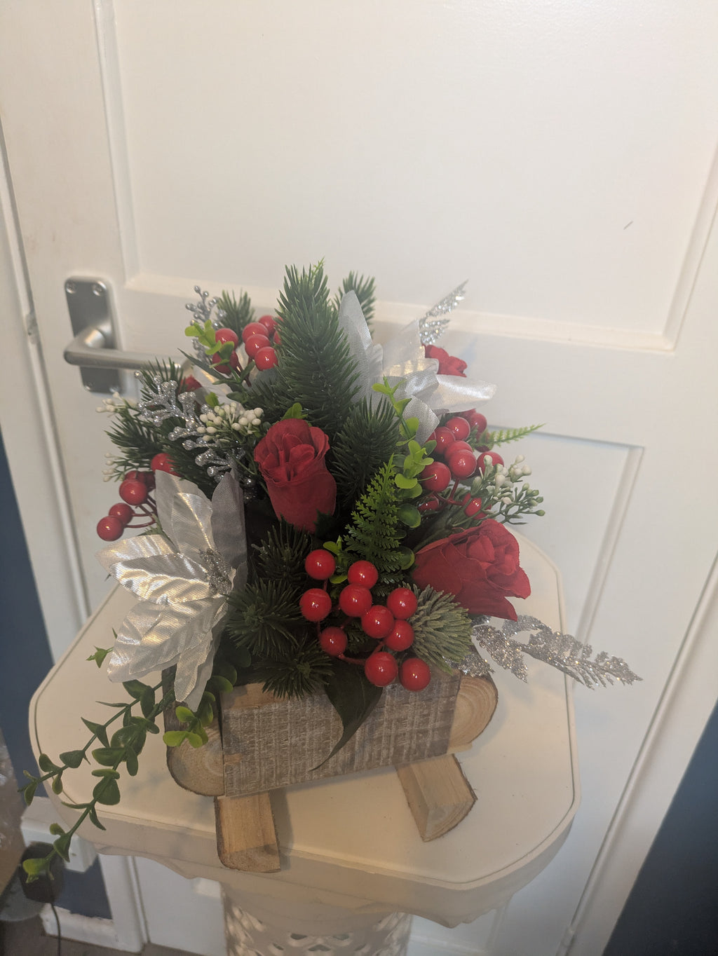 Red, silver and green Sledge Arrangement
