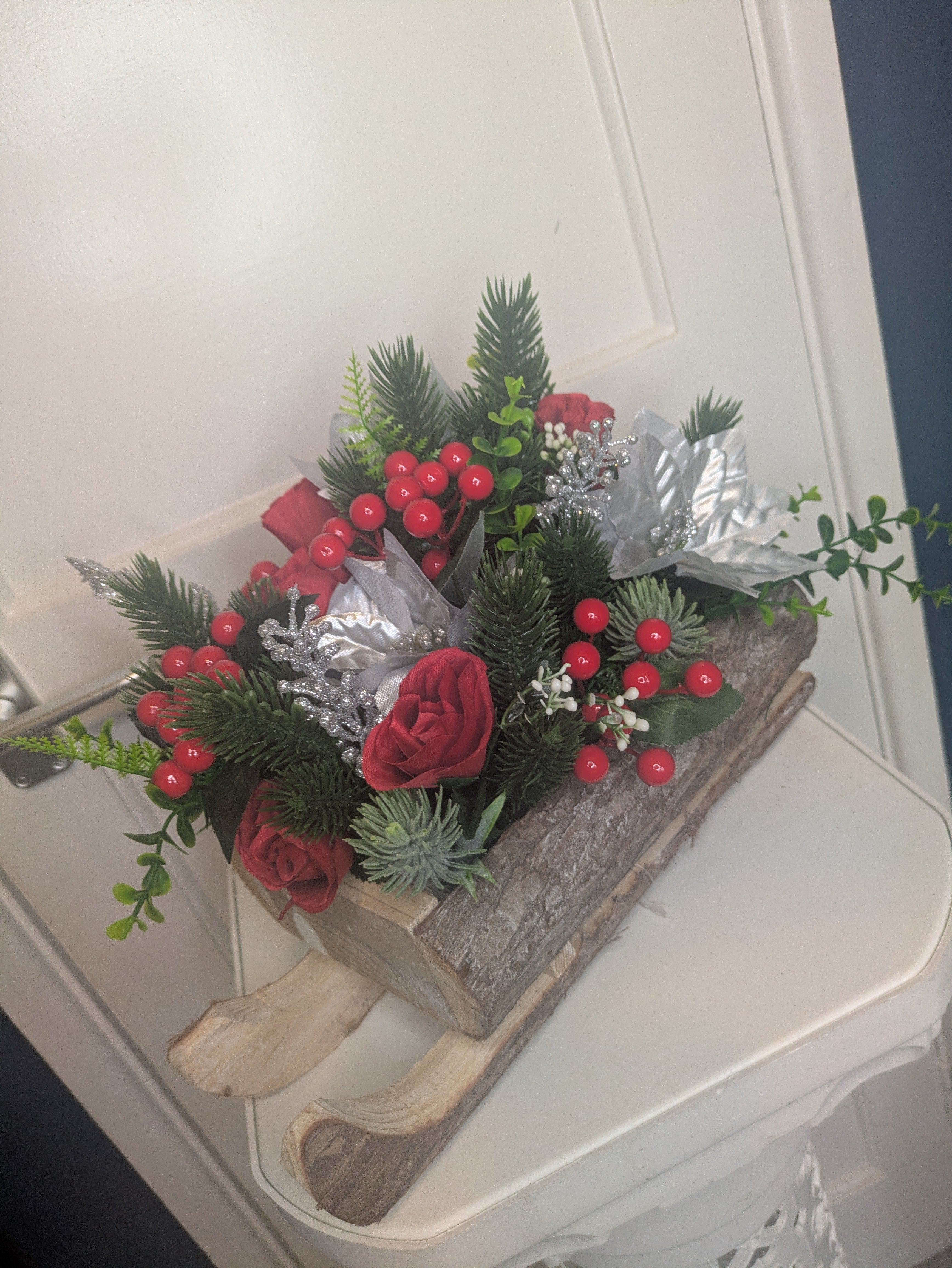 Red, silver and green Sledge Arrangement