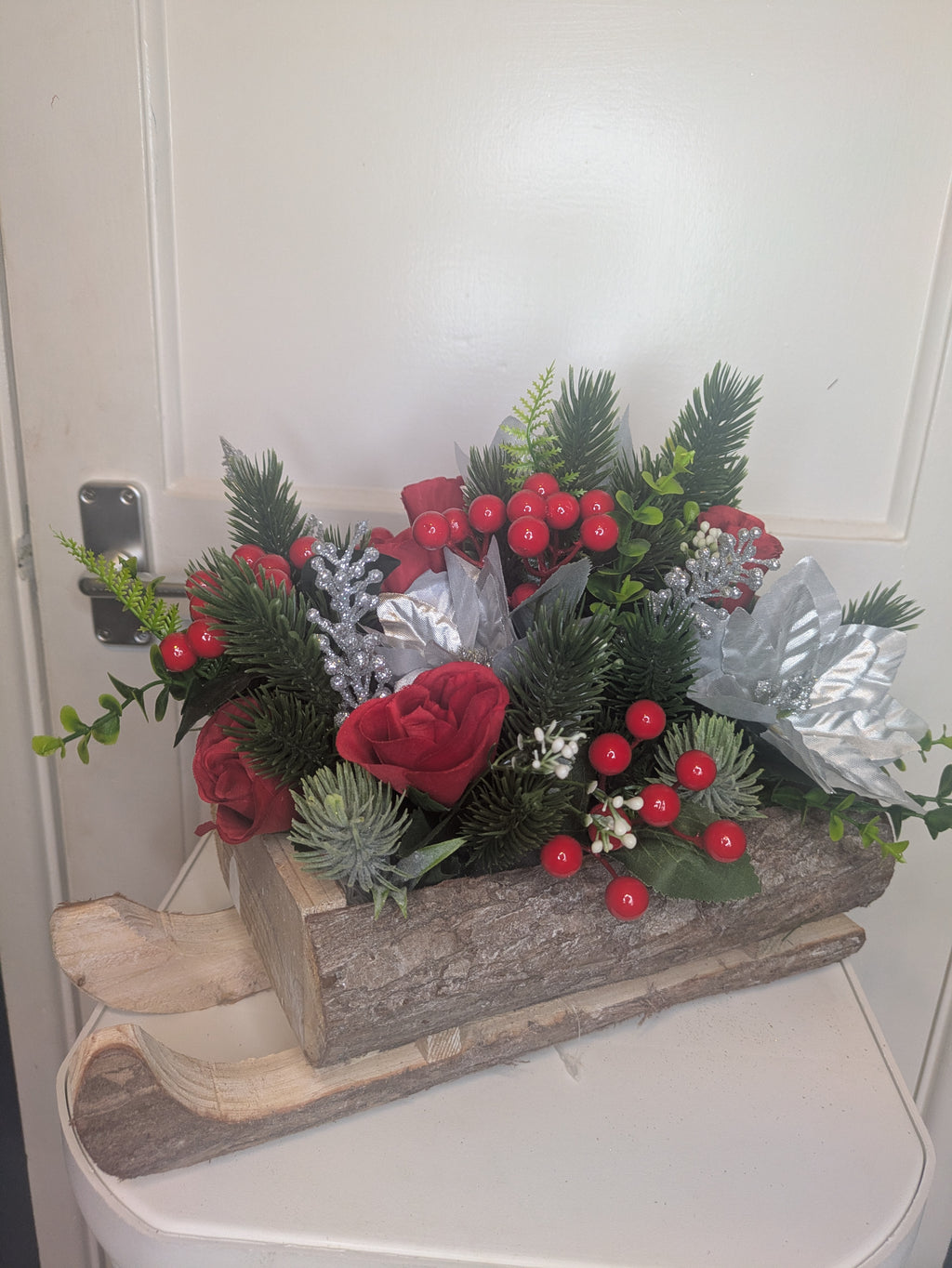 Red, silver and green Sledge Arrangement